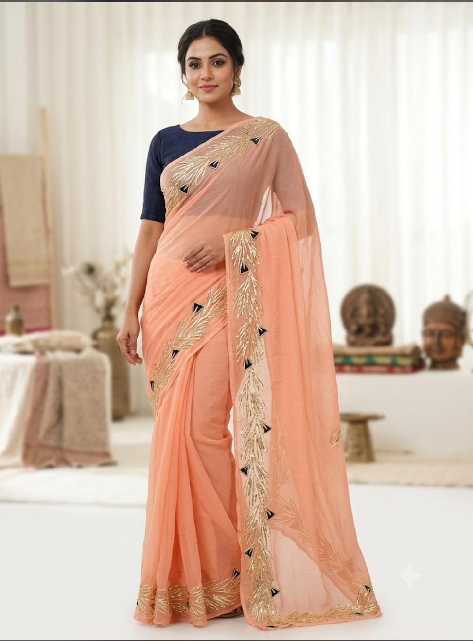 Najbeen peach chiffon darwari saree – close-up of gota pati and black triangle motifs on border