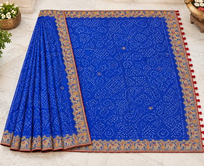 Royal blue bandhani georgette saree – full open flat lay showing all-over bandhani pattern and wide gold elephant border