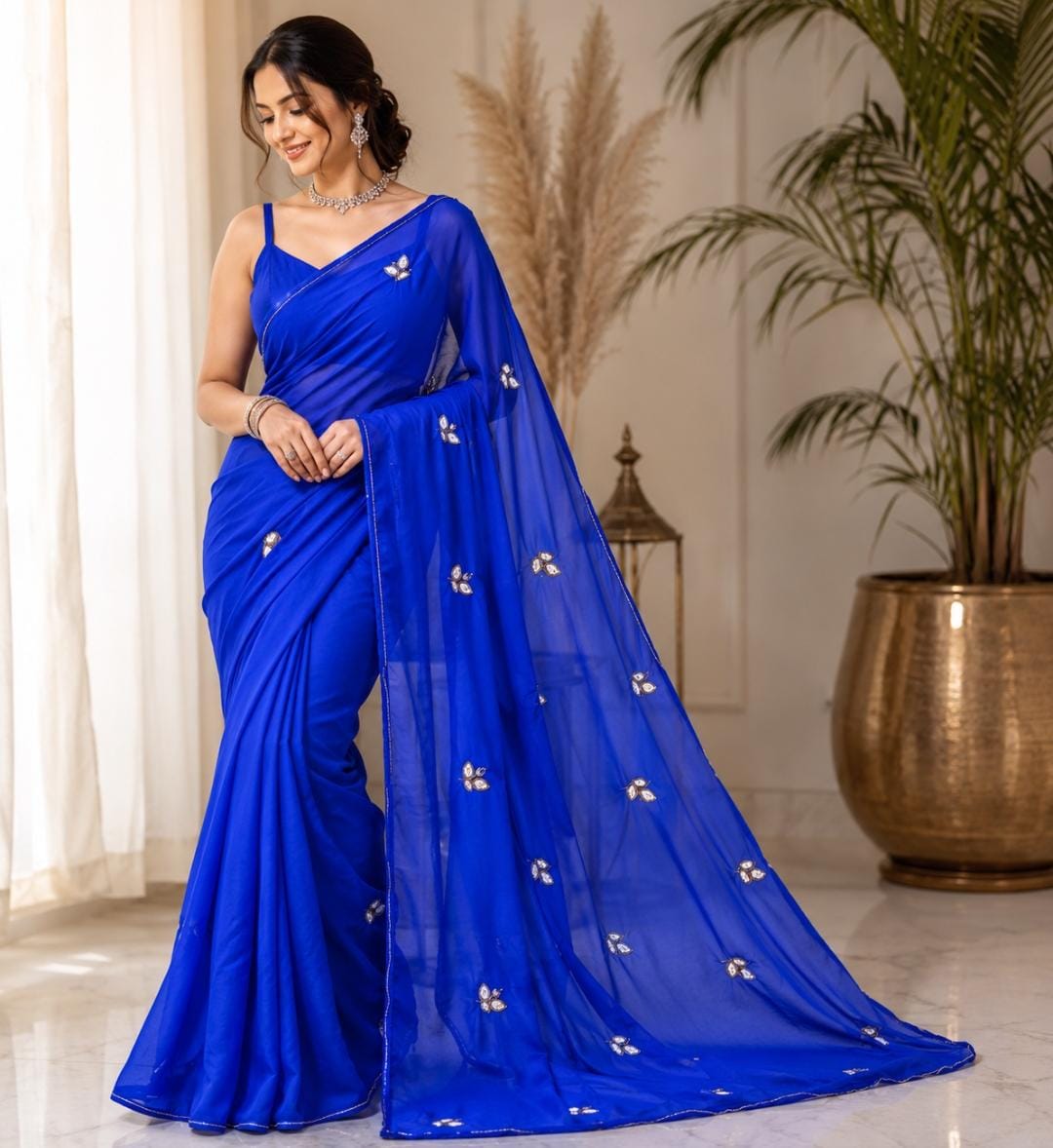 Najbeen royal blue chiffon darwari saree – model standing view with kundan booti and gold border