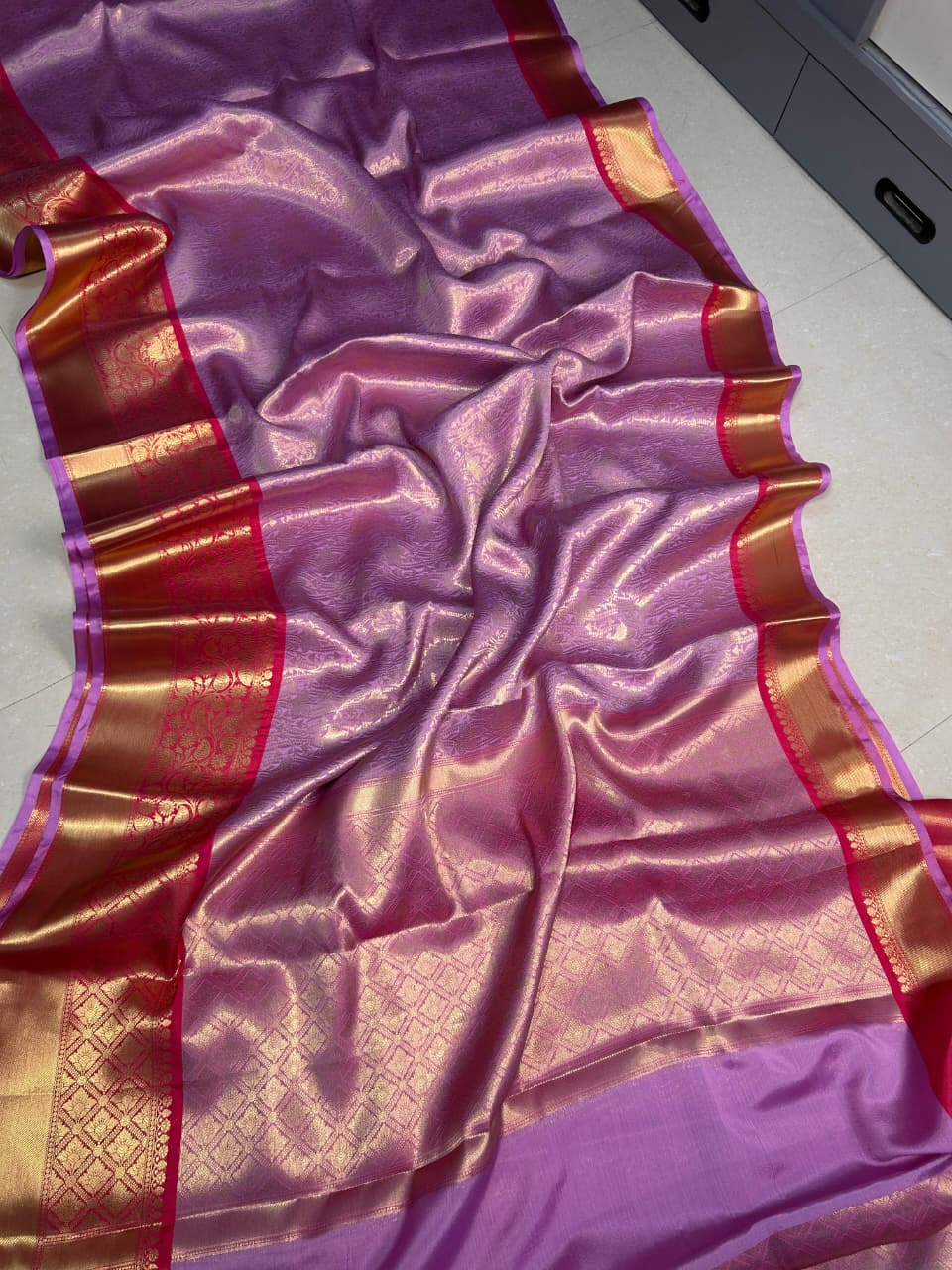 Lavender pink Katan Banarasi saree with wine and gold zari border and woven floral texture