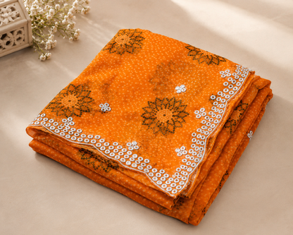 Mustard Yellow Bandhani Georgette Saree - folded flat lay showing bandhani texture and sequin border