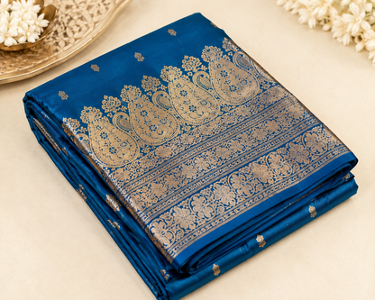 Teal Blue Banarasi Silk Saree with Paisley Zari Border & Scattered Buti Weave | Shreevaa