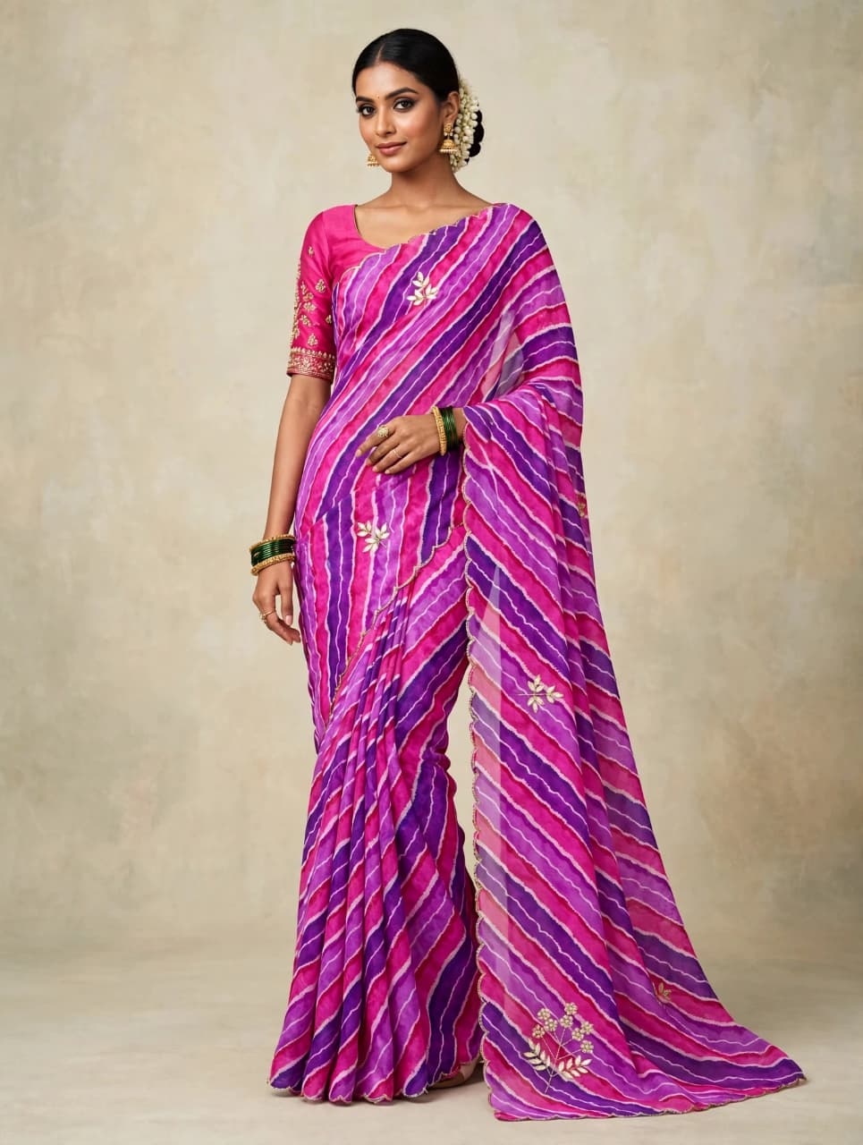 Pink and violet lehariya georgette saree - front standing view